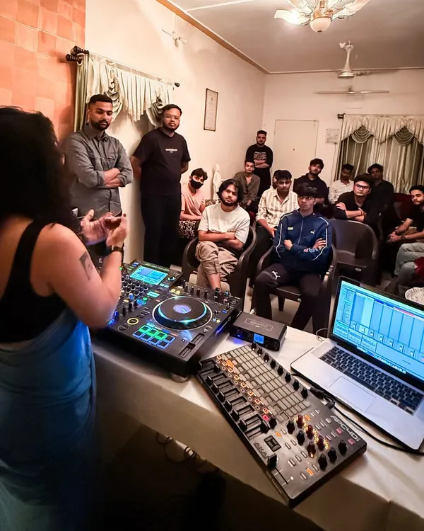 A typical workshop scene. I’m explaining my setup, which includes Pioneer CDJs, a laptop running Ableton, and an APC40 controller. It’s an open floor for questions, where we discuss everything from technical skills to creative mindset.