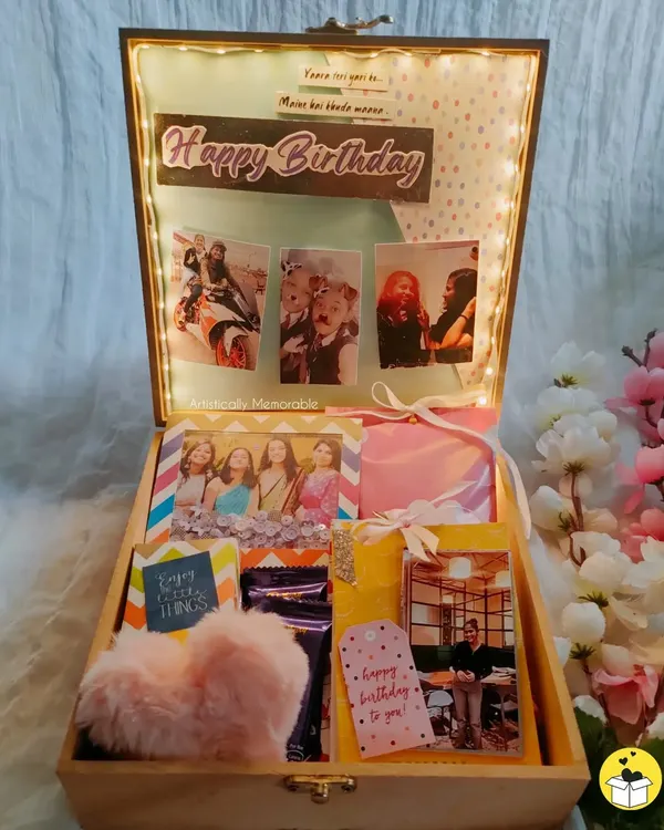 My 'bestie edition' birthday hamper box, all lit up! It's filled with a photo collage, a mini album, a framed quote, and other fun treats.