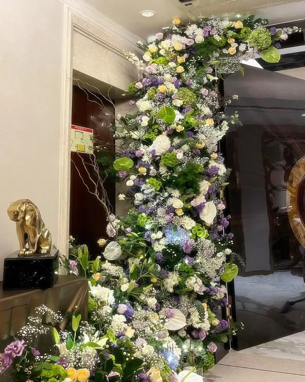 I get so excited about large installations because that's where the magic happens. This floral wave was designed to grow organically around a doorway, creating a statement of abundance and welcoming guests with a burst of natural beauty.