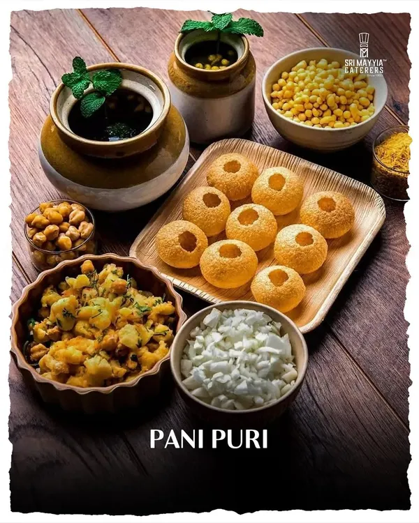A deconstructed view of our Pani Puri station. We use fresh ingredients to create this beloved street food classic, served hygienically at your event.