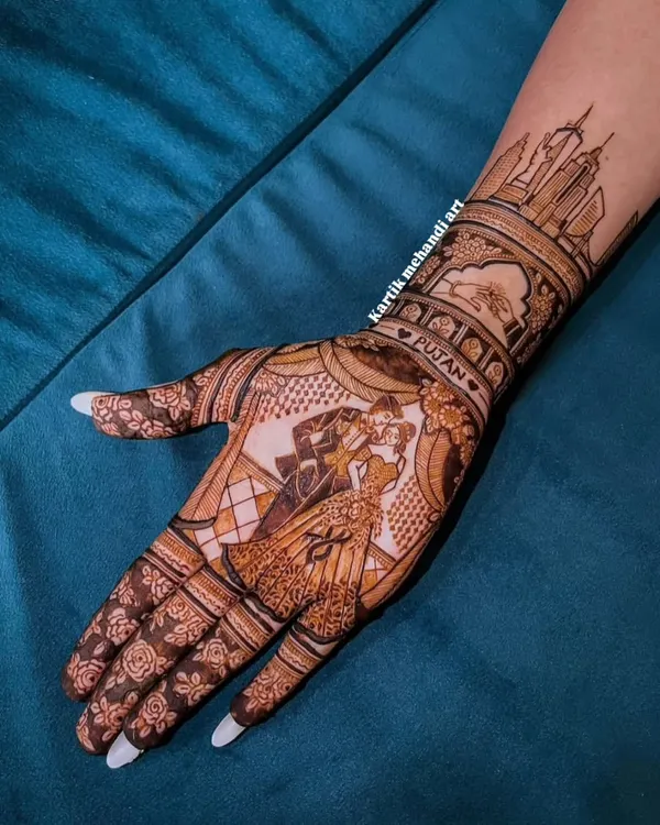 A truly personal touch for an engagement, this design features a portrait of the couple, their names, and a city skyline, telling their love story on her hand.