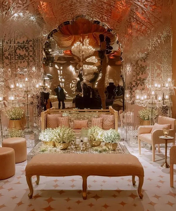 The main hall for the Sufi night, featuring a spectacular mirrored archway that reflects the candlelight beautifully. We used plush, low seating in pastel tones to create a comfortable and opulent lounge feel.