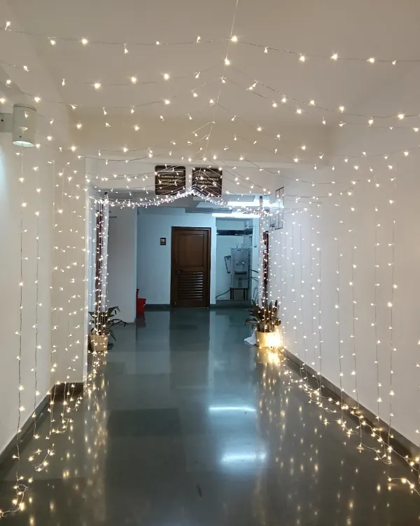 A magical entrance for an engagement ceremony. I created a tunnel of fairy lights to welcome guests and lead them to the celebration.