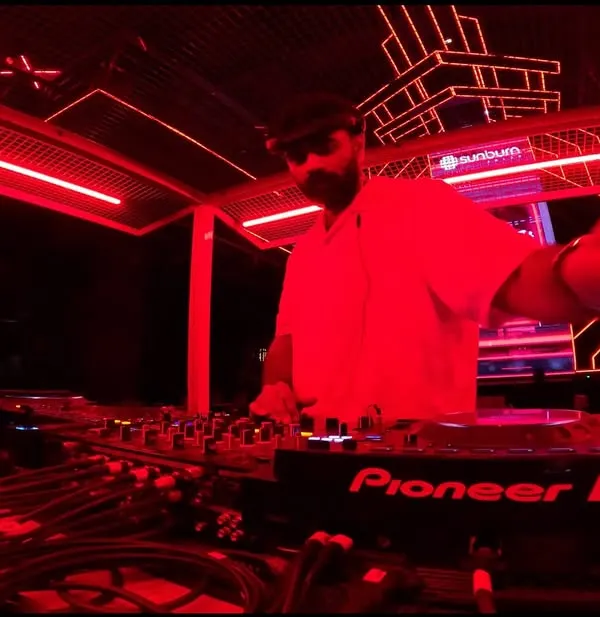 A dynamic, wide-angle shot from the DJ booth at Sunburn Union Bangalore. The intense red lighting and futuristic setup show the premium club environment I perform in.