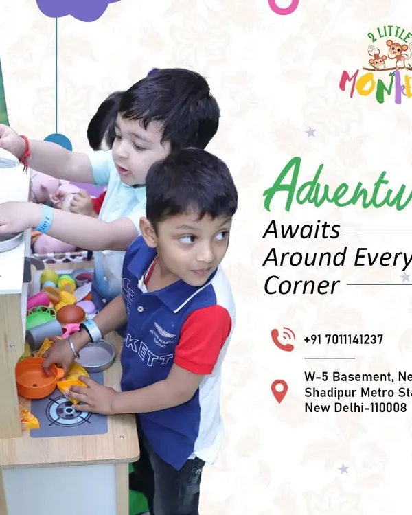 Adventure awaits around every corner, even for our littlest guests. Here, two young friends are engaged in imaginative play at our toy kitchen station, learning to share and create together in the toddler play area.