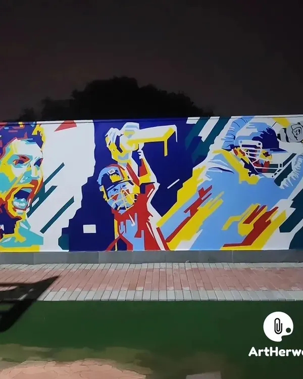 A vibrant, pop-art style mural celebrating the passion of cricket, painted in Faridabad. The artwork captures the intense emotion of the players in a blaze of color.