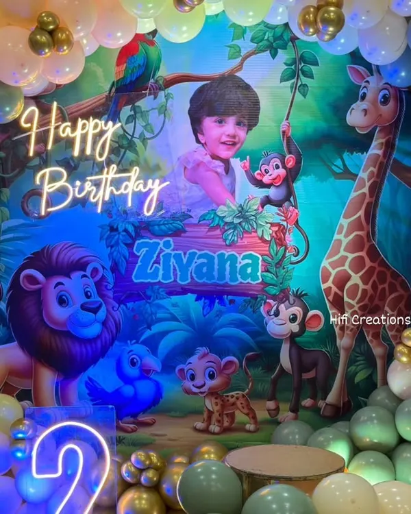I bring your child's favorite stories to life with detailed themed decorations. This jungle-themed birthday features a custom backdrop with characters from The Lion King, a vibrant balloon arch in jungle colors, and a personalized neon sign, creating a perfect photo opportunity.
