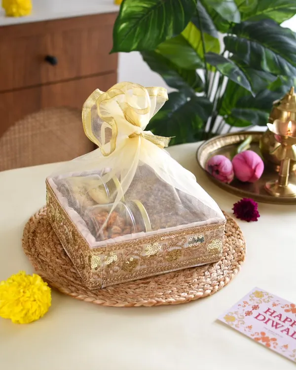 This is my Desi Delight Gift Basket, beautifully arranged for Diwali. It’s a perfect example of how I combine traditional flavors with a touch of luxury, featuring my popular Baklava Tea Cake, spicy masala cashews, and almond pista cookies, all ready to be gifted.