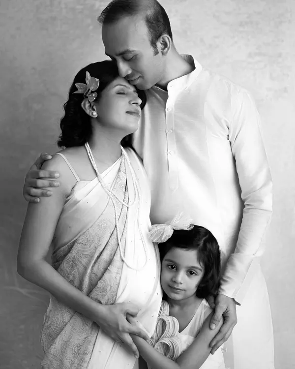 A timeless black and white version of a beautiful maternity portrait. Removing the color emphasizes the serene expressions and the deep connection of this growing family.