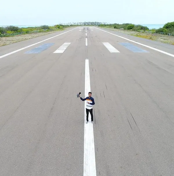 Aakela hi kafi ho. Sometimes it's just me, my drone, and an entire runway to myself on Agatti Island, Lakshadweep. This shot gives a sense of the scale and adventure involved in getting that one perfect aerial shot.