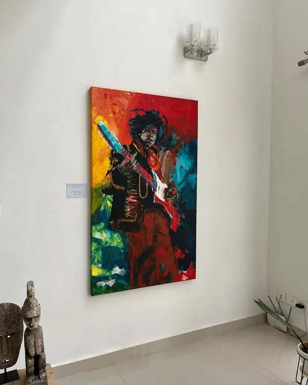 This 5x3 feet acrylic on canvas portrait of Jimi Hendrix captures his explosive energy through bold colors and expressive brushwork. It is a centerpiece of our music legends collection and is available for purchase.