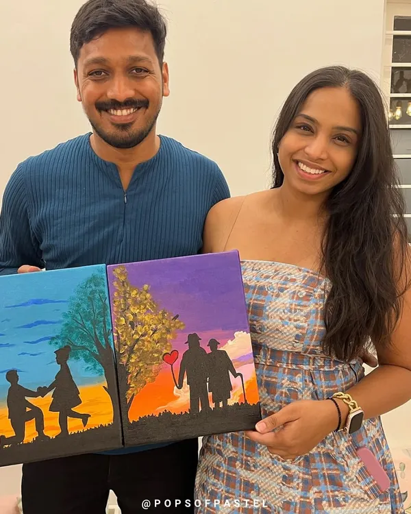 A picture-perfect anniversary celebration. This couple created a beautiful diptych painting that tells a story, from a proposal to growing old together.