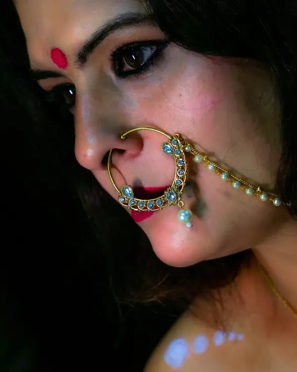 A close-up on a traditional bridal nose ring (nath). I believe that the right piece of jewelry can elevate an entire look and tell a story of its own.