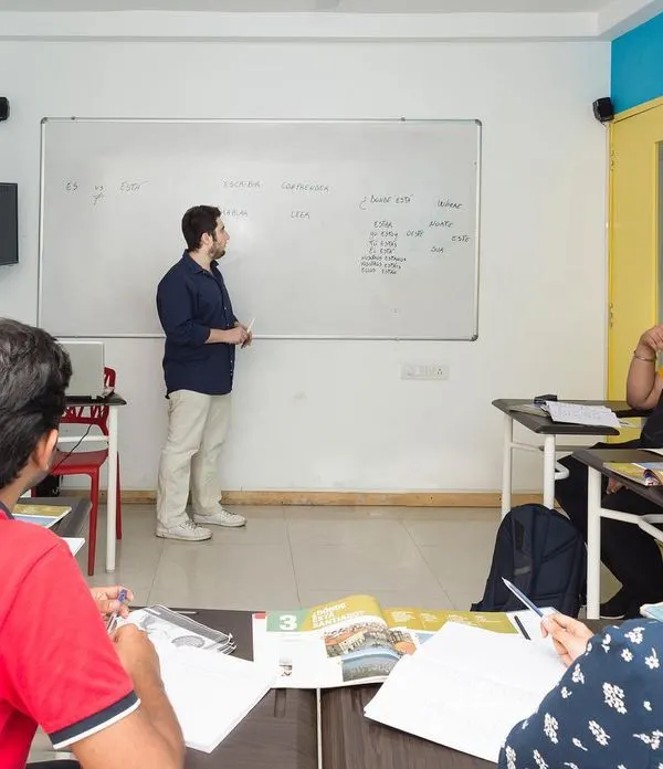 A snapshot of a live classroom session. Our trainers guide students through concepts on the whiteboard, encouraging active participation and discussion.