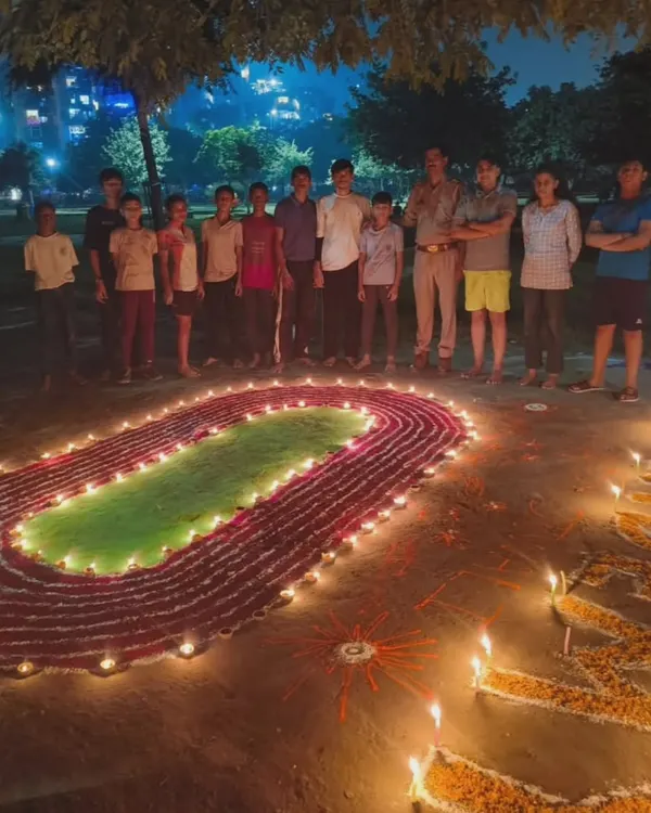 My students are my family. This photo captures our annual Diwali celebration, where we trade the training ground for a moment of community and light. It's all about the bond we build.