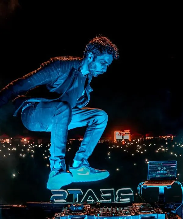 This is the moment I live for. Jumping on the console with a sea of lights in front of me at a massive college festival. This is the energy I bring to every single gig.