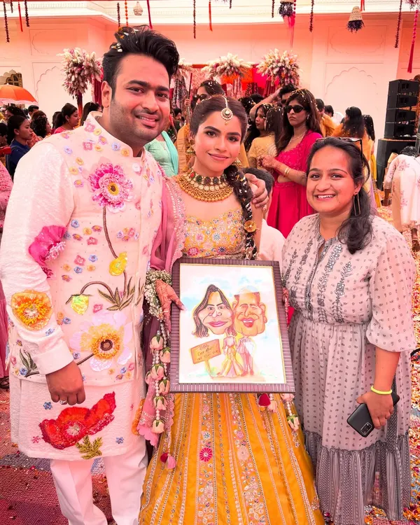 A beautiful couple with their framed caricature on their special day. This is more than a gift; it's a personalized piece of art to remember their wedding.