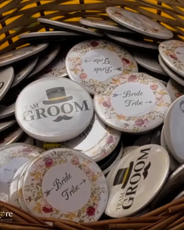 Fun 'Team Groom' and 'Bride Tribe' badges for guests. These little details are a great way to get everyone involved and add a playful element to the wedding festivities.