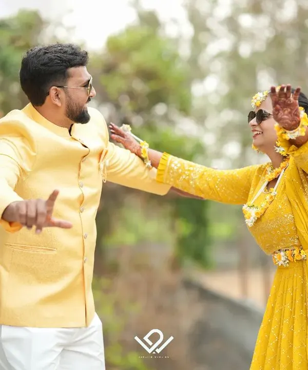 Pure fun and energy during a Haldi ceremony, with the couple dancing and enjoying the moment.