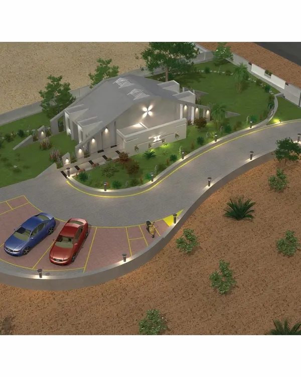 An aerial 3D visualization of the Pechimuthu Memorial. This view shows the complete site plan, including the building's placement within a dense landscape, the winding access path, and the designated parking area, all designed to create a serene journey.
