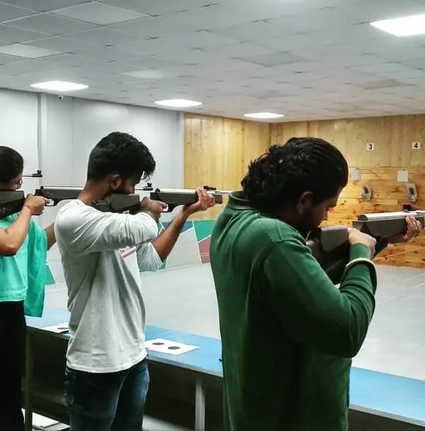 A group of friends enjoying a recreational shooting session together. We find that learning to handle an air rifle is a great activity for groups looking for a unique and memorable outing.