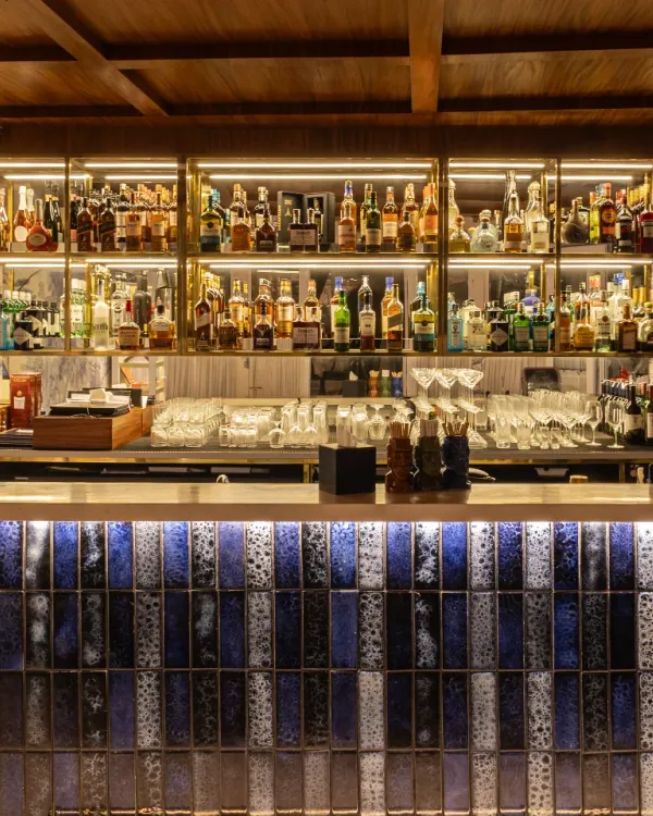Our indoor bar, fully stocked with a wide selection of spirits and liqueurs, where our bartenders craft both classic and innovative cocktails.