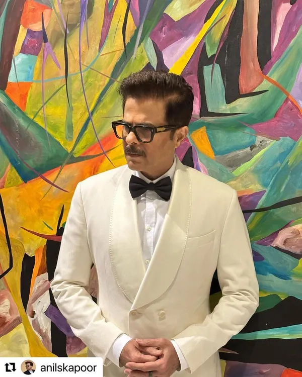 A classic black-tie look for Anil Kapoor at the IIFA awards. The hairstyle is sharp, clean, and sophisticated, perfect for a formal event.