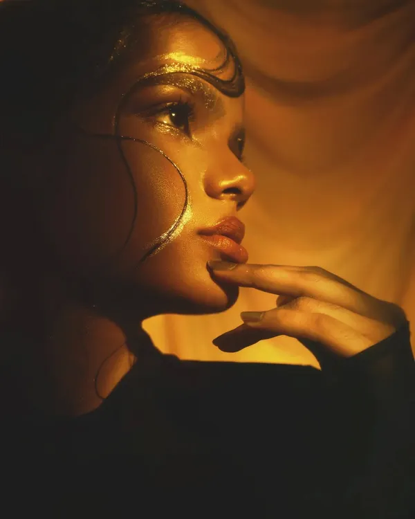 A close-up of the golden dynasty look. I used gold leaf and graphic shapes to create a look that feels both ancient and futuristic, perfect for a high-fashion editorial.