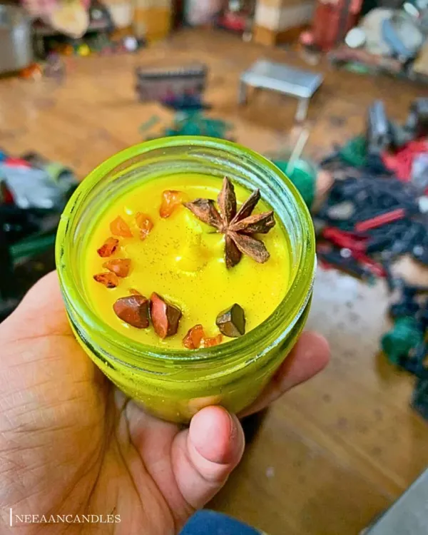 This is sunshine in a jar. I hand-poured this vibrant yellow candle and topped it with star anise and healing crystals to fill your space with warmth, happiness, and positive energy.