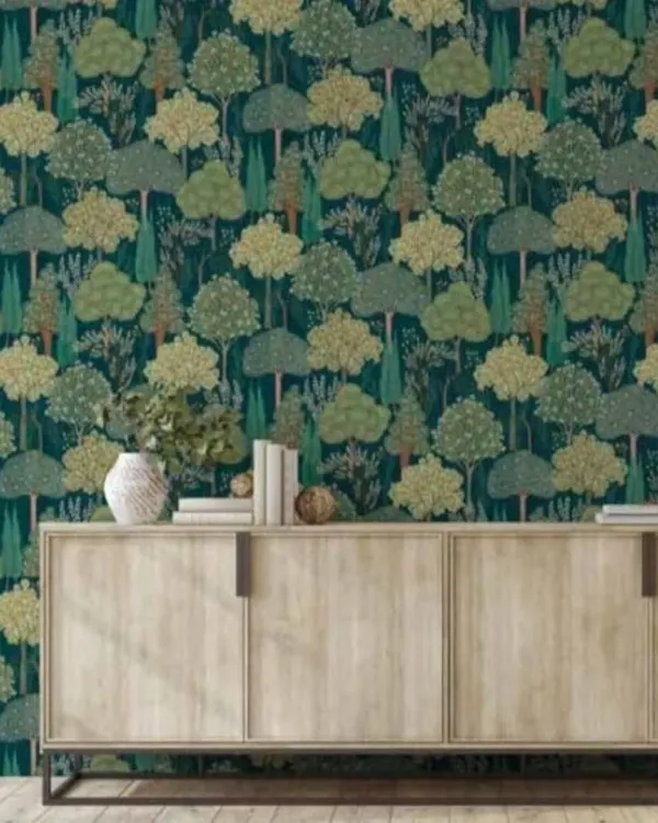 This is the kind of transformation I love to see. A high-quality botanical wallpaper from my collection turns a simple wall into a sophisticated and serene feature. This design, with its detailed trees on a deep teal background, is perfect for living rooms or bedrooms.