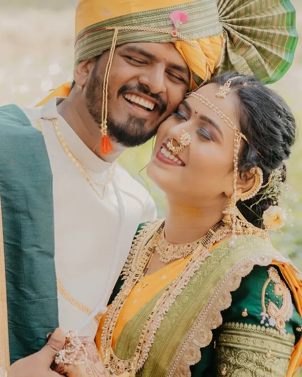 This is the kind of moment I live to capture. Pure, unscripted joy during a traditional Maharashtrian pre-wedding shoot. The laughter, the colors of the pheta and saree, and the genuine connection are what make a photograph truly unforgettable.