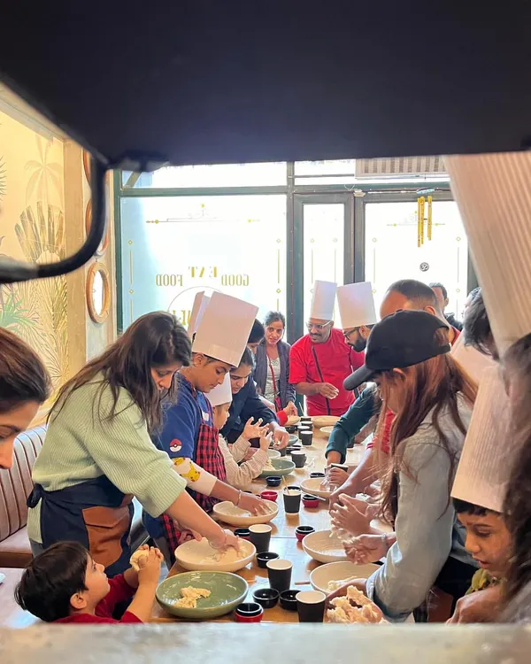 A candid shot of one of my family workshops. It's a full house with kids and parents all getting their hands doughy and learning together.