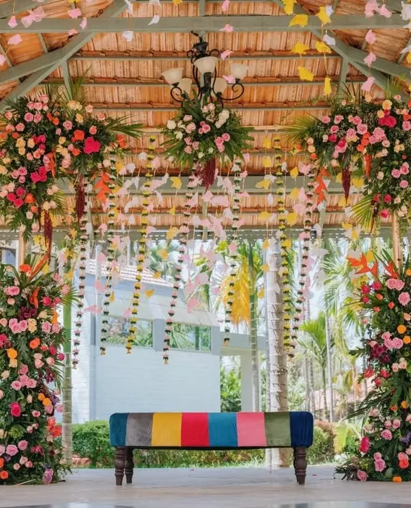 We believe every event is a canvas. For this engagement, we transformed an open-air pavilion into a floral wonderland, using a spectrum of colors to reflect the couple's vibrant personalities.