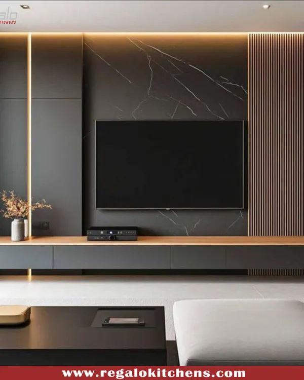 A dramatic and sophisticated TV unit. We combined dark, textured panels with a wood-finish console and integrated vertical lighting for a moody, cinematic feel.