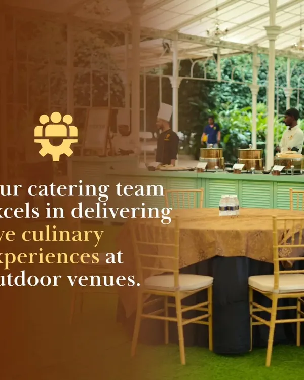 Our catering team excels in delivering live culinary experiences at outdoor venues. Here, our chefs are set up in a beautiful glass-walled pavilion, ready to serve guests fresh and delicious food.