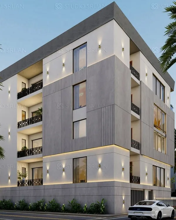 An angular view of the 280 sq. yard Kirti Nagar residence, highlighting the interplay of different facade materials and the strategic placement of lighting to create a dynamic look.