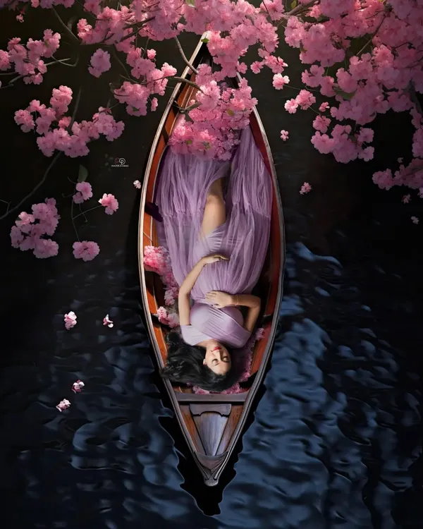 A truly magical maternity portrait for this mom-to-be, floating in a boat surrounded by beautiful lavender blossoms. This artistic concept shoot is perfect for creating a one-of-a-kind memory of your pregnancy journey.
