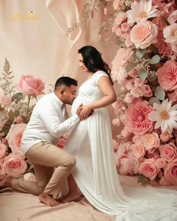 A truly magical moment for these parents-to-be, surrounded by a wall of flowers. I love creating these highly stylized, fine-art maternity portraits that feel like they are straight out of a fairytale.