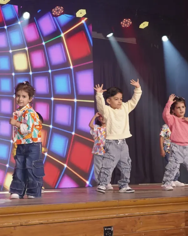 Our toddlers taking their first steps on stage. These classes are all about building confidence, learning basic rhythm, and having a great time in a supportive environment.