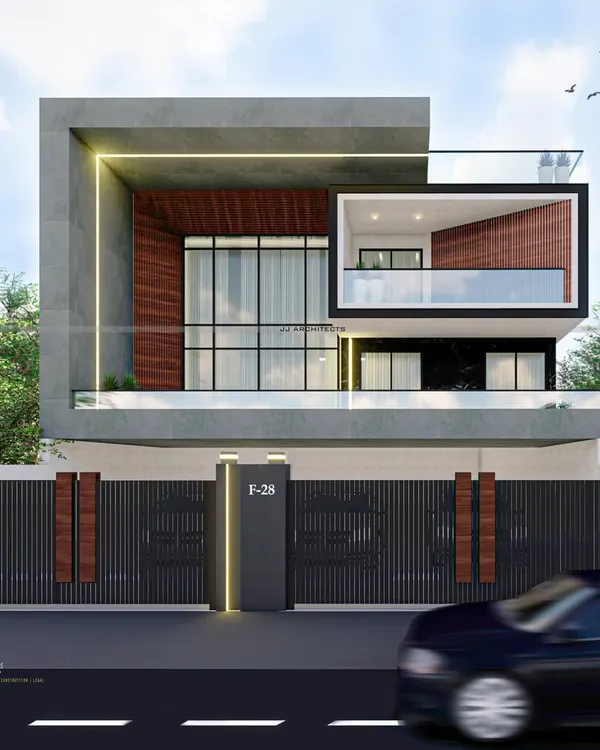 A 500 square yard modern home we designed and built in South Delhi. The design features a bold, geometric facade with a mix of concrete, wood, and glass for a contemporary look.