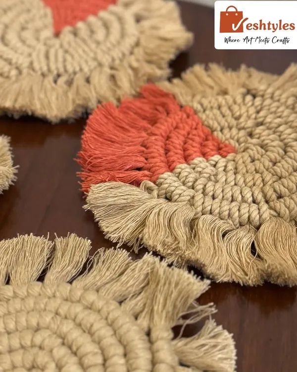 My colorful table coasters are a great way to add a pop of color to your coffee table. This set features a mix of jute with orange accents.