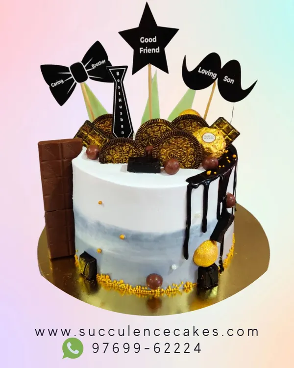 This cake was designed to celebrate all the roles a man plays: a caring brother, a good friend, and a loving son. The theme is brought to life with custom toppers, chocolate bars, and a stylish blue-grey watercolor effect.