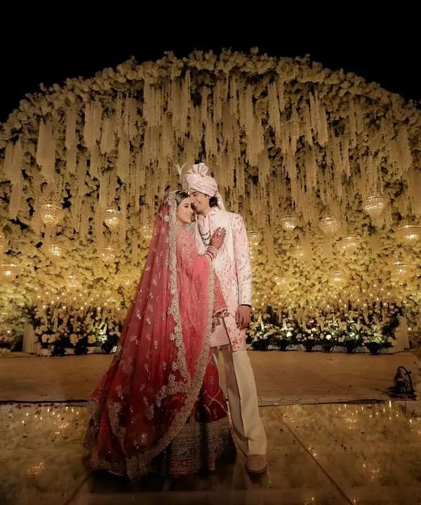 A moment of forever, framed by a spectacular dome of cascading white florals. I design these larger than life backdrops to make your most cherished memories feel as magical as a fairytale.