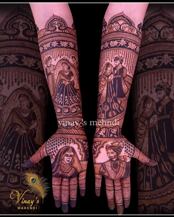 I believe your mehndi should tell your unique love story. This full bridal design features custom portraits of the couple, their varmala ceremony on the arms, and intricate traditional patterns to create a masterpiece that is deeply personal and unforgettable.