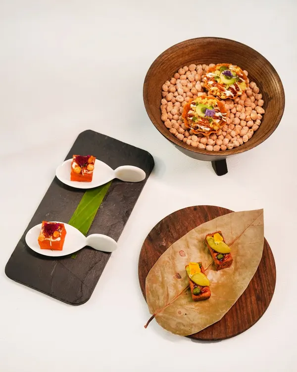 A playful prelude to the Indian Accent experience. Here, you see our dhokla bites, chaat canapés, and kothimbir vadi, each a familiar flavour thoughtfully reimagined with clever textures and surprising pairings.