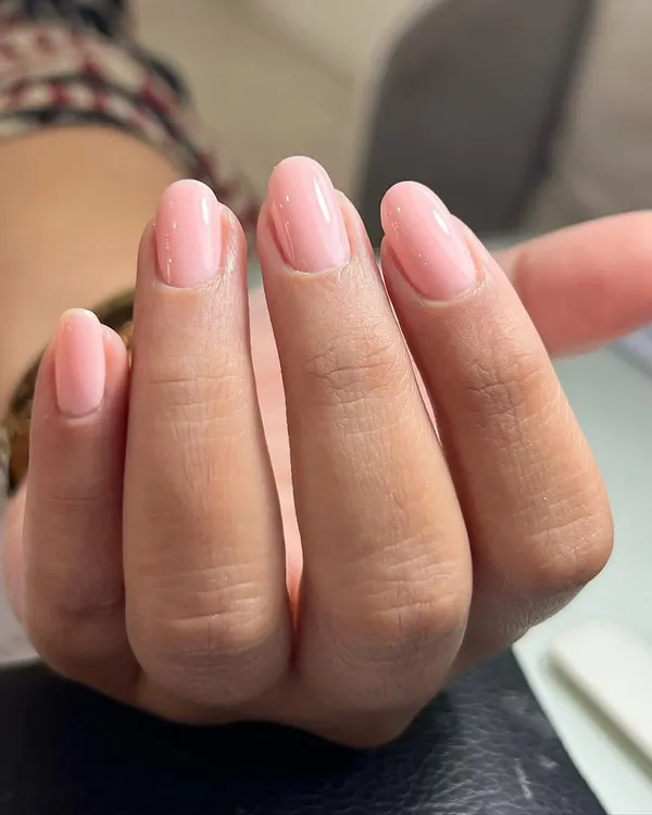 This is a perfect example of a clean Russian manicure. The focus here is on precise cuticle work and flawless application of a single color. The result is incredibly neat, making the natural nails look healthy and perfectly shaped.
