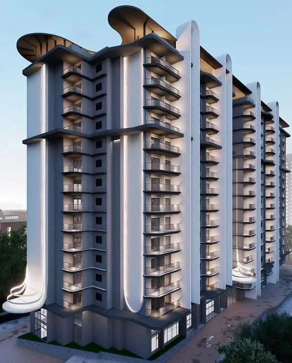 This apartment complex in Mangalore features a refined and well-balanced facade. Clean, modern arches and vertical fins create a play of light and shadow, giving the building a sophisticated and timeless look that reflects the city's architectural essence.
