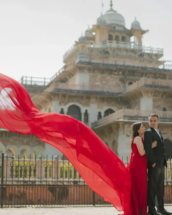 This is the kind of magic we create in Jaipur. I combine the grandeur of historic locations like the Albert Hall Museum with dramatic, modern elements like this flowing red gown to craft a pre-wedding photo that is truly unforgettable.