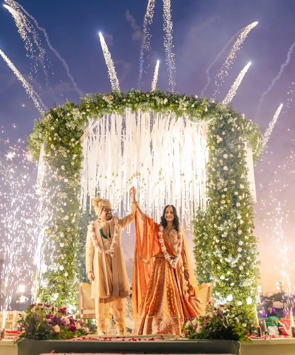 This is what it feels like when your love story lights up the sky. I live for these grand, cinematic moments that feel like they're straight out of a movie, capturing the scale of your celebration in Bhuj under a canopy of fireworks.