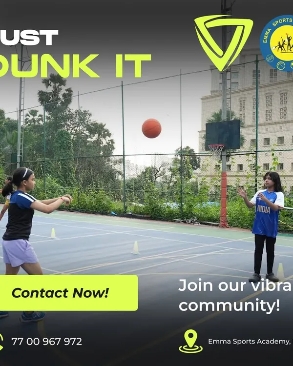 Two young girls practicing their passing on our outdoor court. I create a vibrant community where players can learn and grow together.
